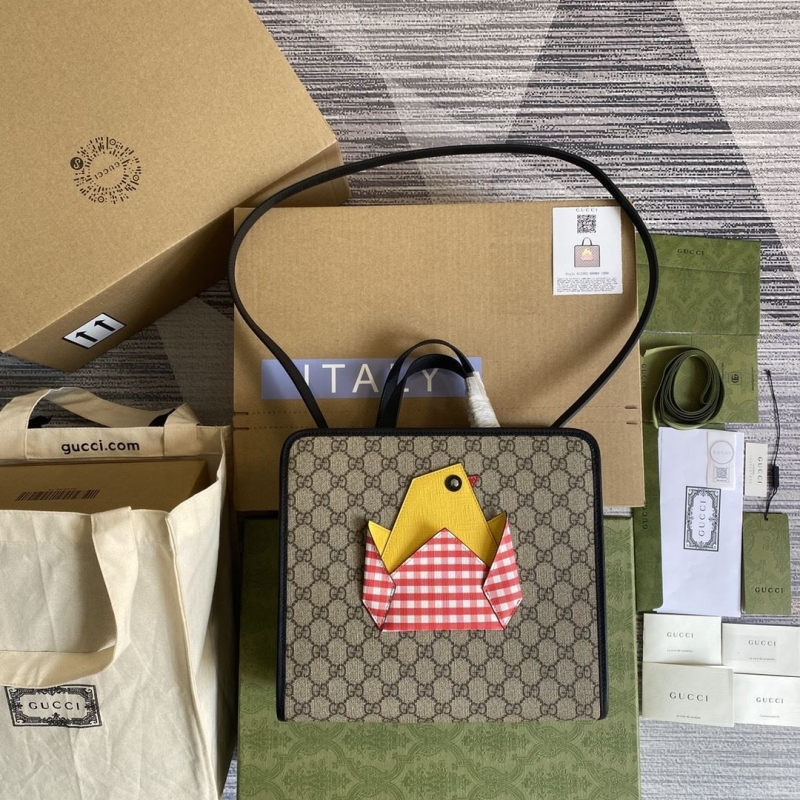 G*u*i shopping bags